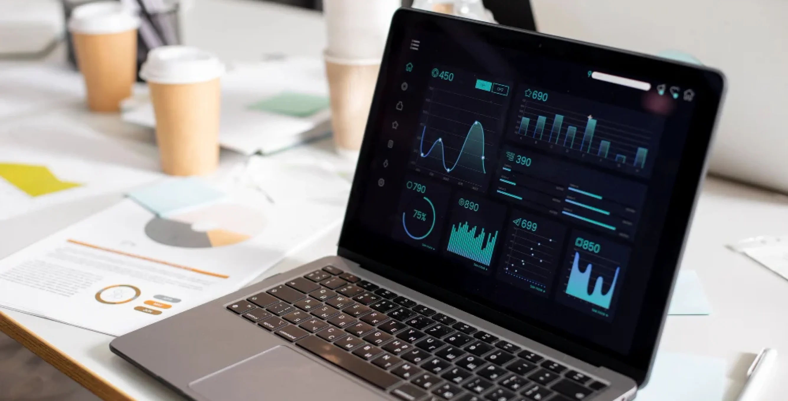 High-fidelity Figma prototype of an industrial dashboard on a professional laptop.