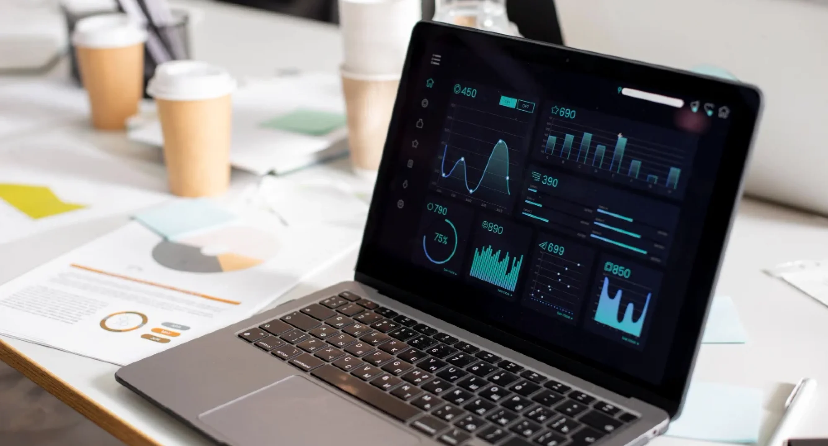 High-fidelity Figma prototype of an industrial dashboard on a professional laptop.